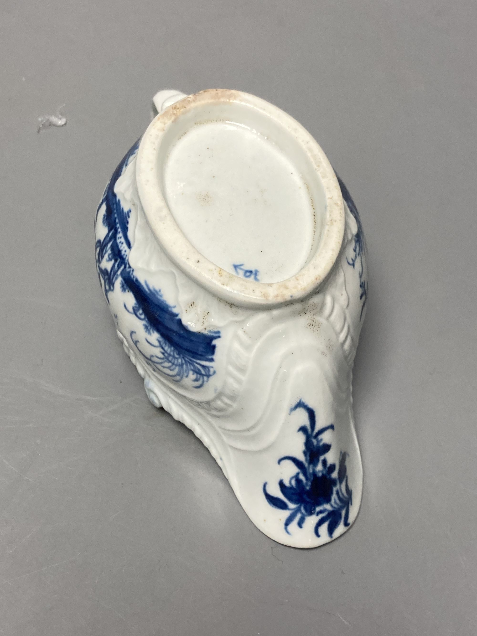 A Worcester Two Porter pattern blue and white small sauceboat circa 1760-5, workman's mark, length 13cm